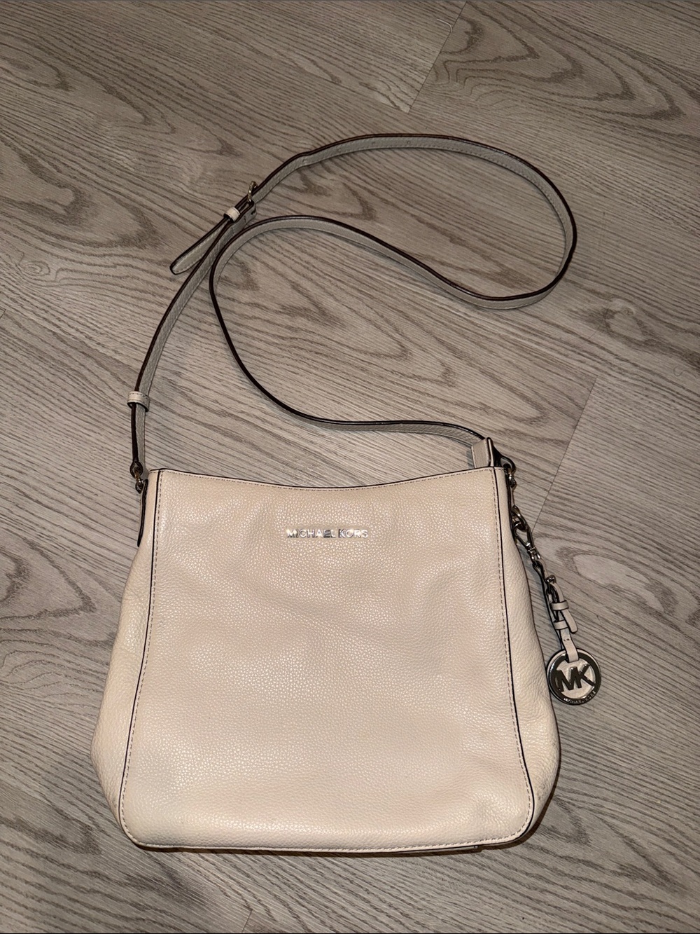Michael Kors Cream Pebbled Leather Crossbody with MK Charm